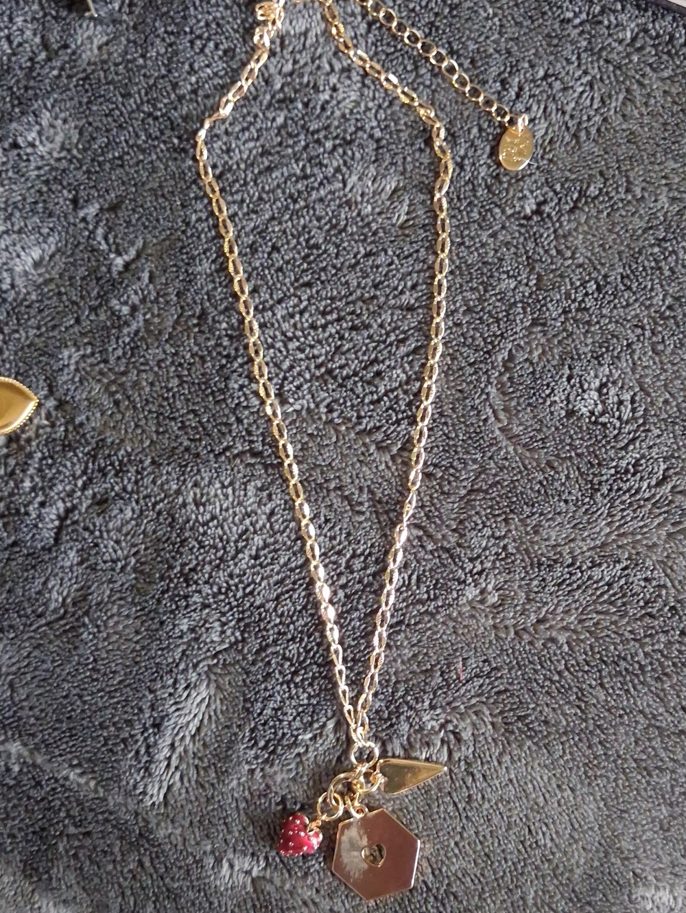 Gold Tone Charm Necklace with Red Heart Accent